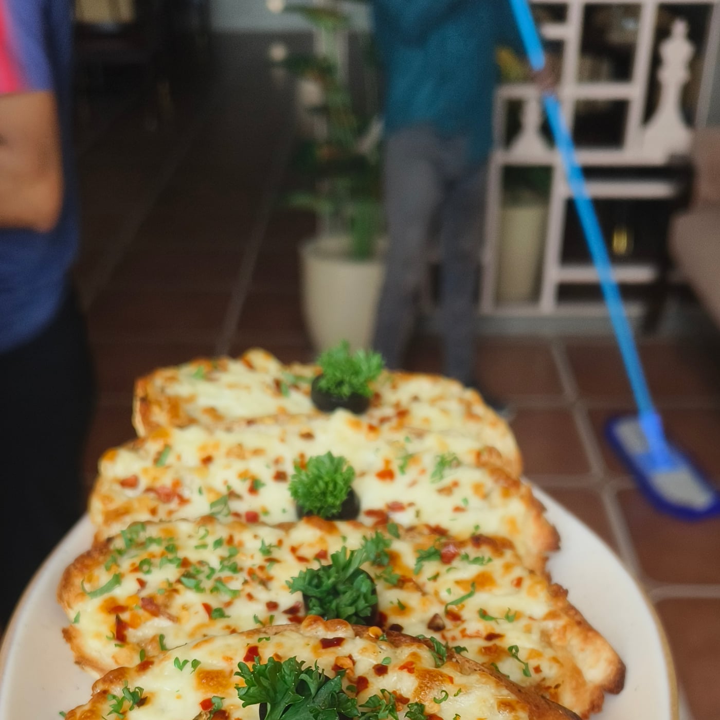 Cheese garlic bread slices at The Cosmo