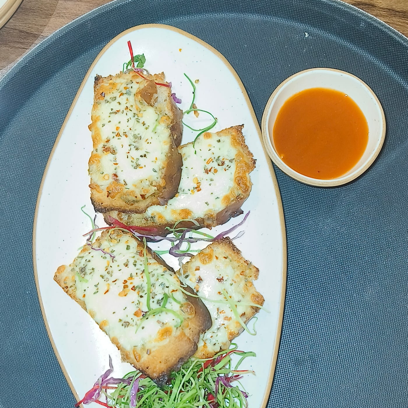 Signature cheese garlic bread toast at The Cosmo