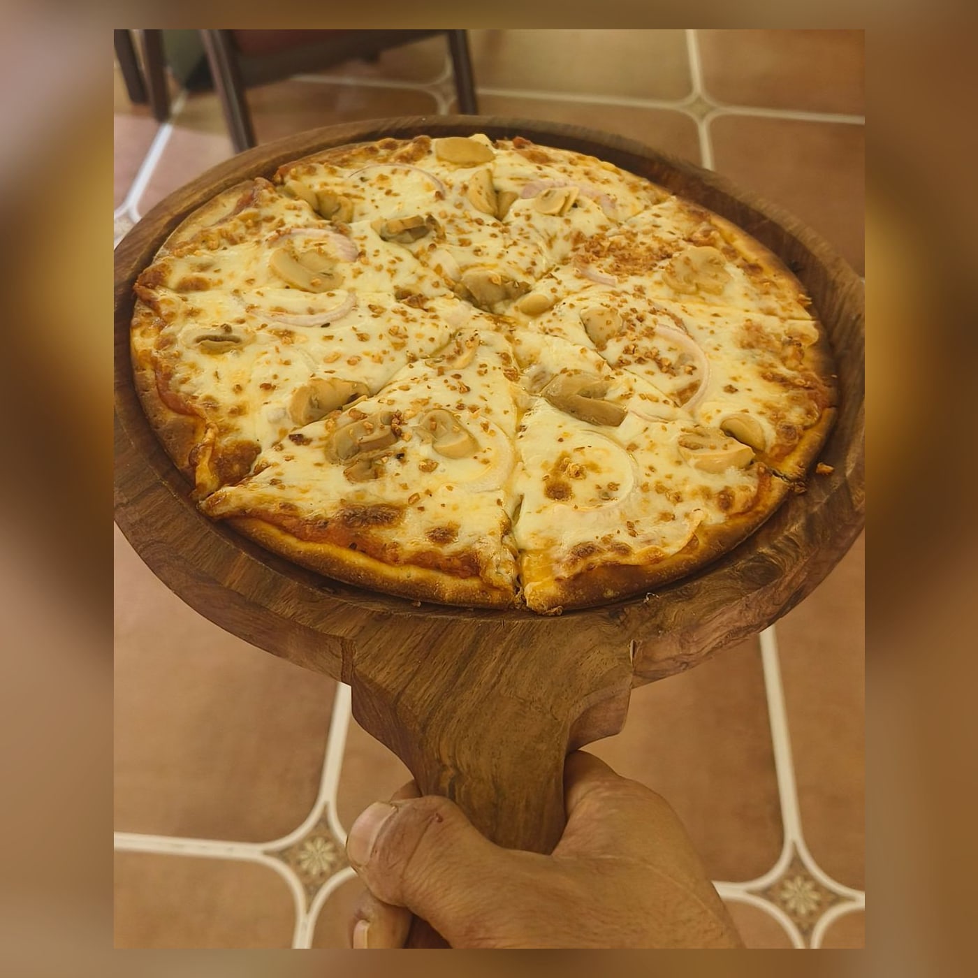 Mushroom and onion pizza at The Cosmo