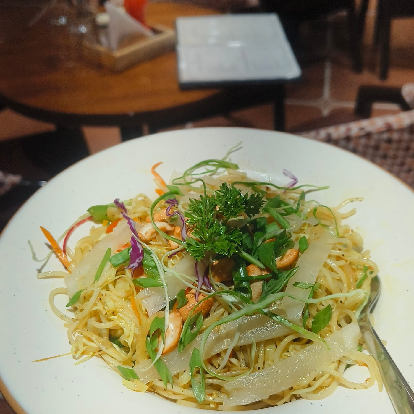 Singaporean noodles with cashews at The Cosmo