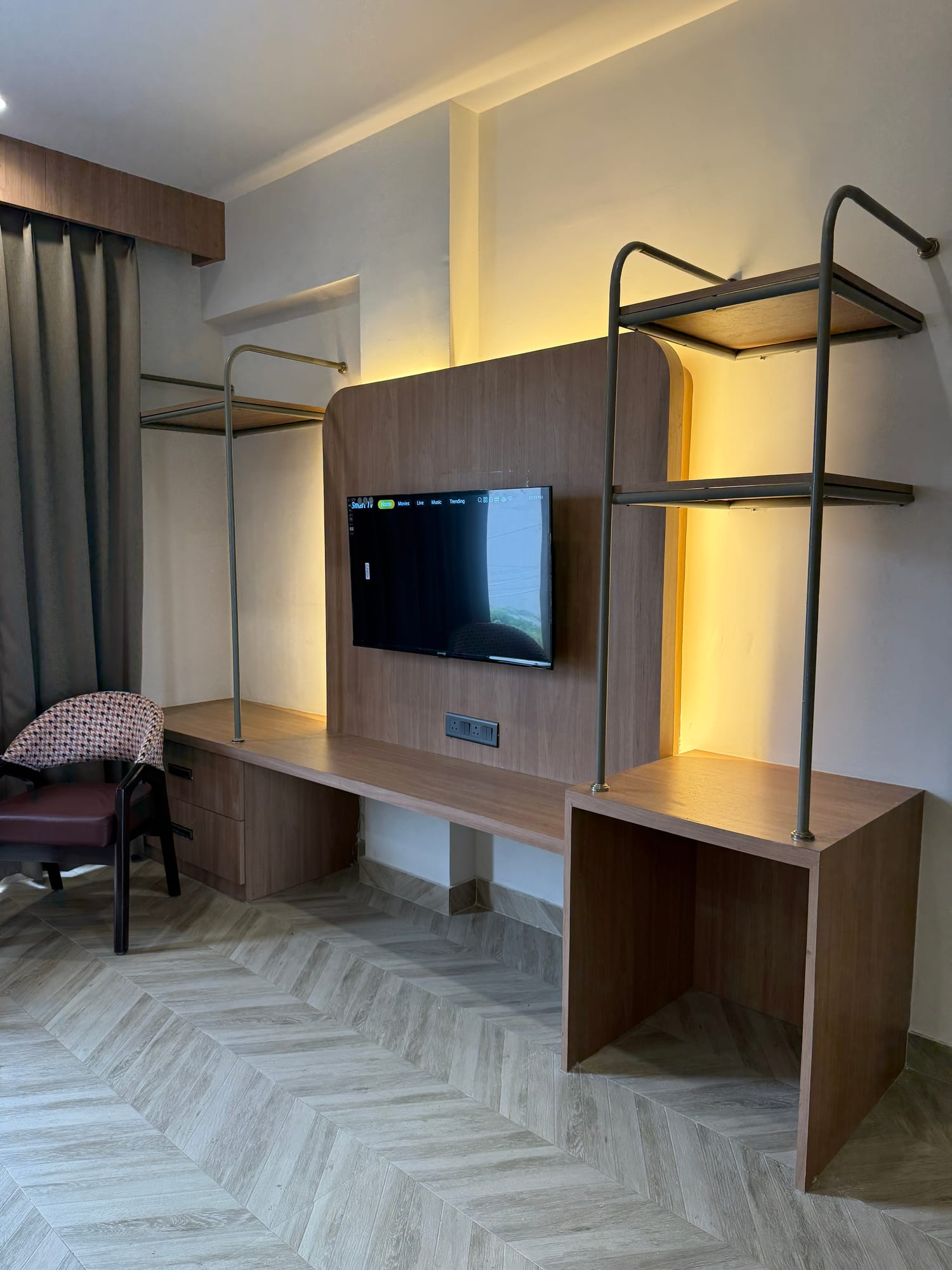 Backlit Smart TV wall in a Cosmo luxury room