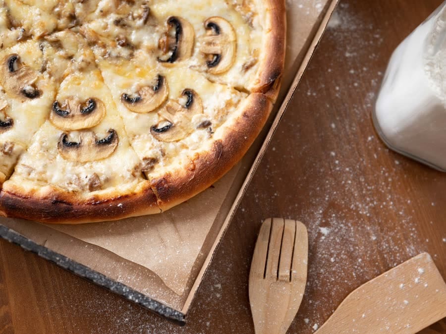 Mushroom, Roasted Garlic, Onion And Capers Pizza